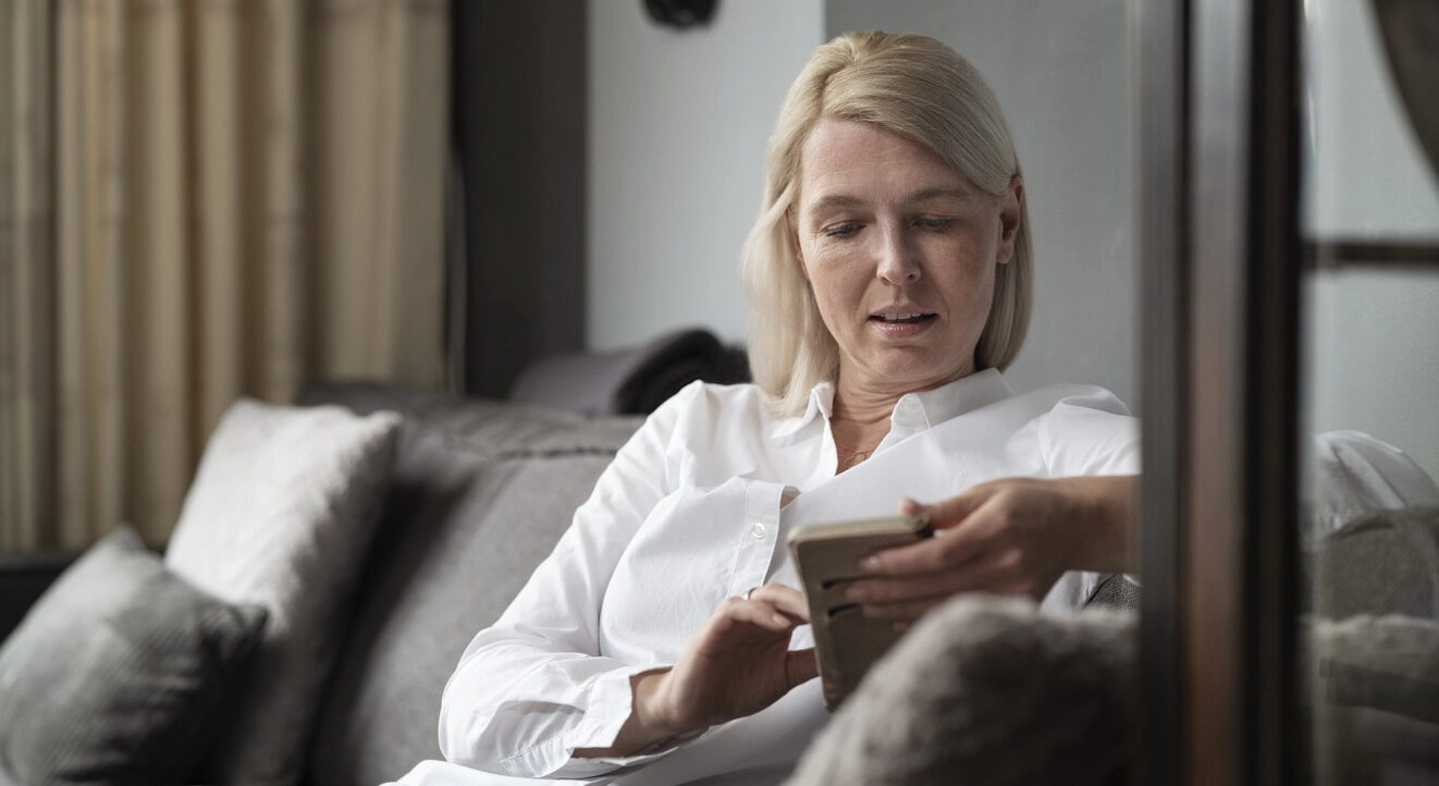 Image of Ilse sitting in her living room. Multiple Sclerosis causes damage to the nervous system, disrupting messages from the brain, and can therefore interfere with a wide range of bodily functions. Your bladder can be particularly susceptible to disruption.  